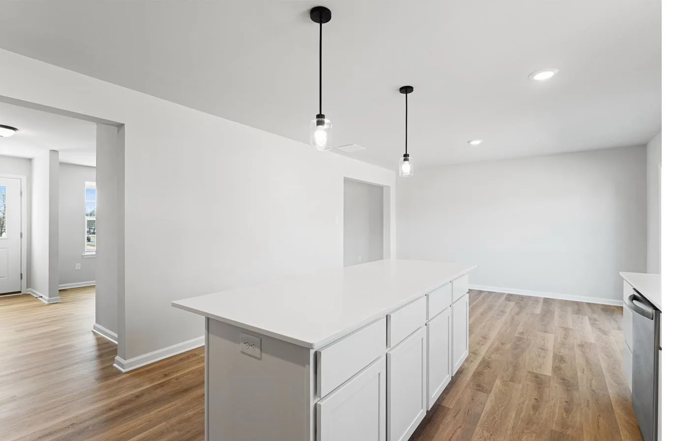 Isabella 2-car garage model kitchen close-up with granite countertops — new construction Vineland NJ