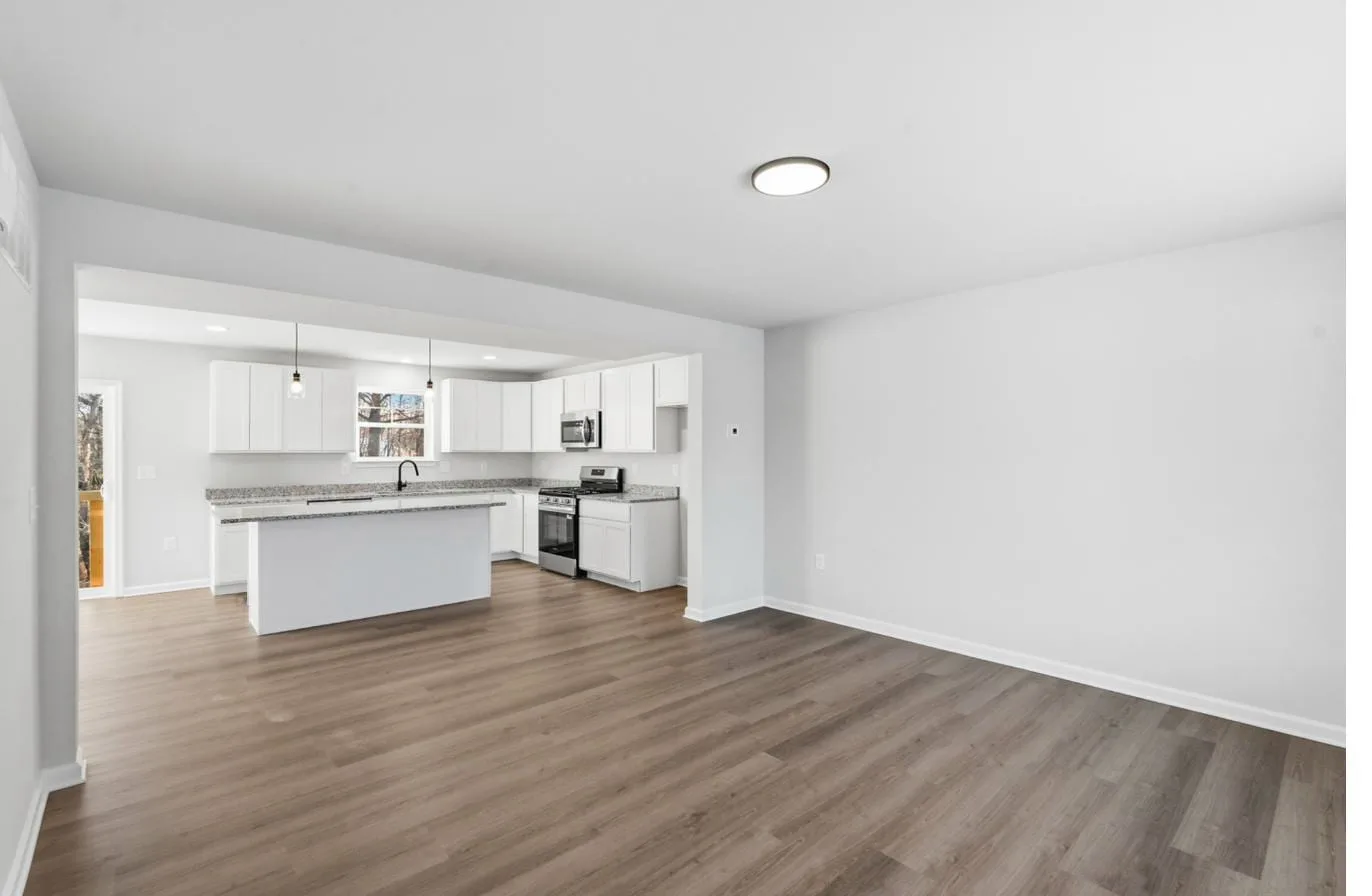 Chelsea 1-car garage model living room open to kitchen — new construction South Jersey