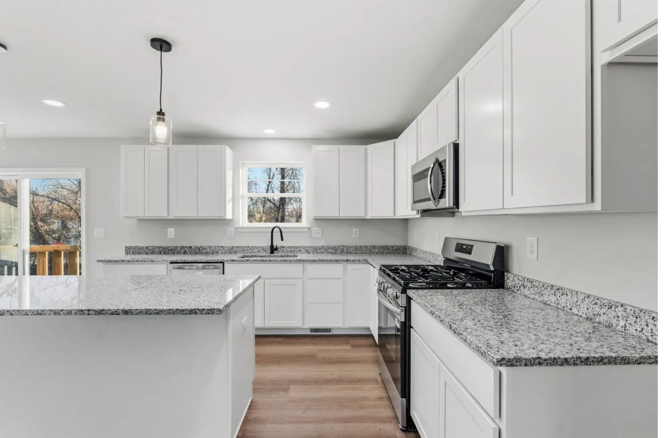 Chelsea 1-car garage model kitchen countertops and stainless appliances — new construction South Jersey