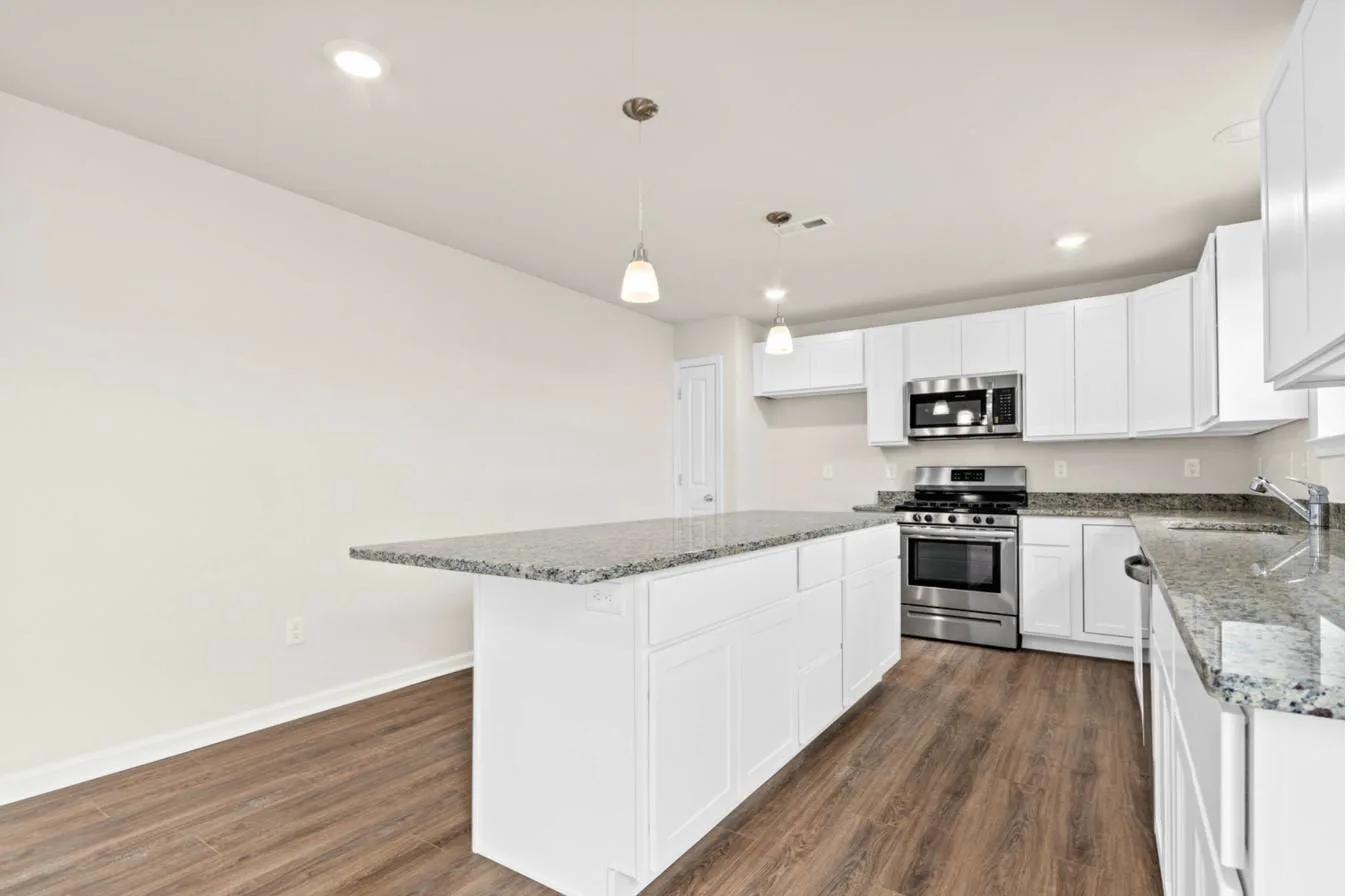 Cooper model kitchen with granite island — new construction South Jersey